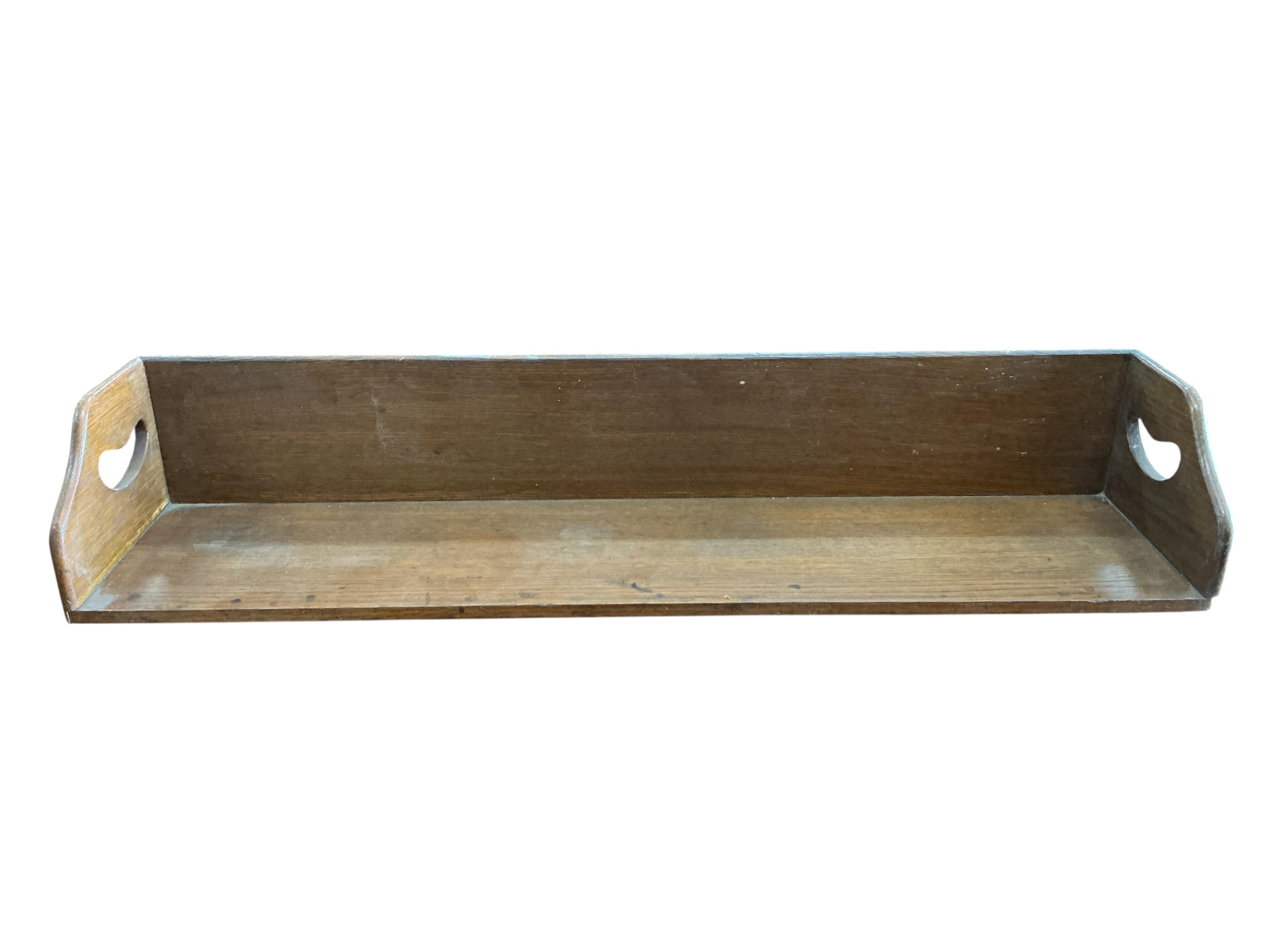 A pair of oak book troughs, width 86cm, depth 20cm, height 15cm